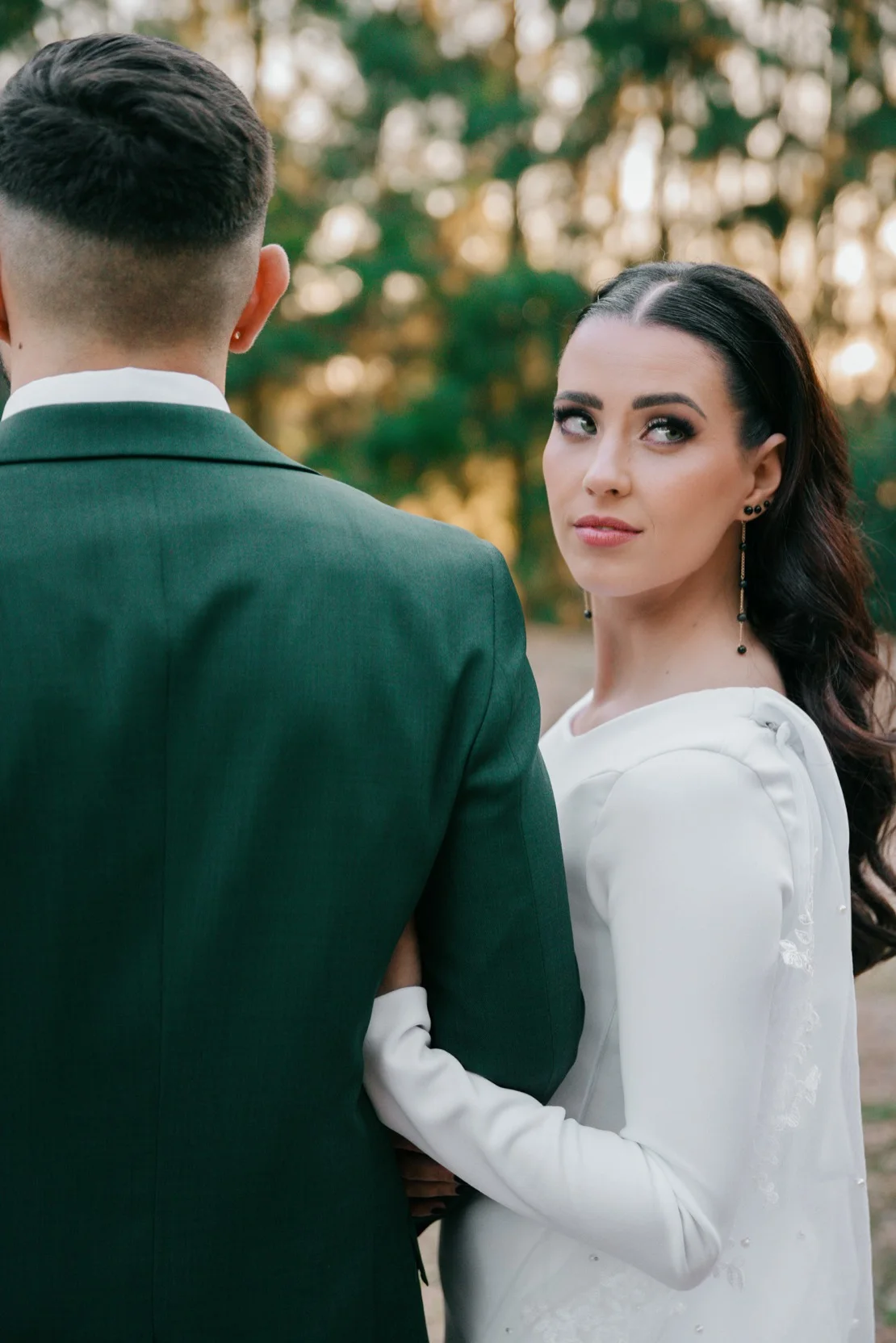 Bride looking at the groom candidly over his shoulder, Pretoria wedding