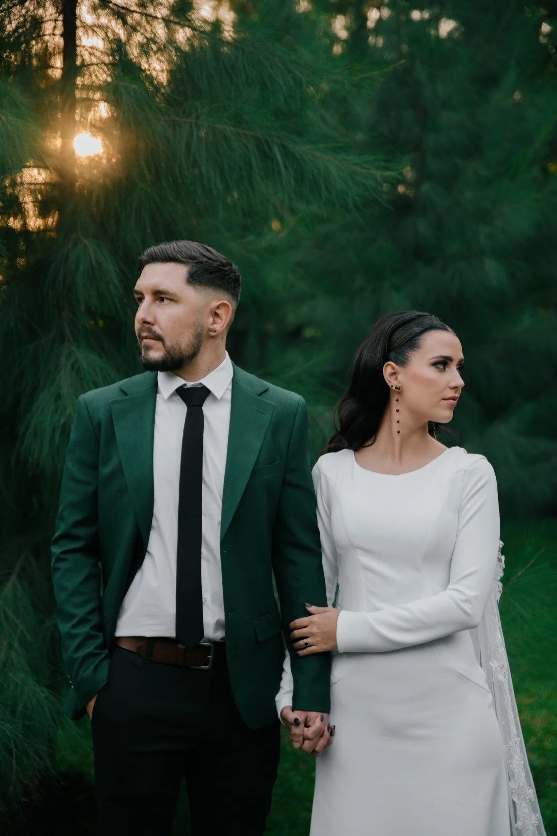 Bride and groom standing together in a forest at sunset, Pretoria wedding
