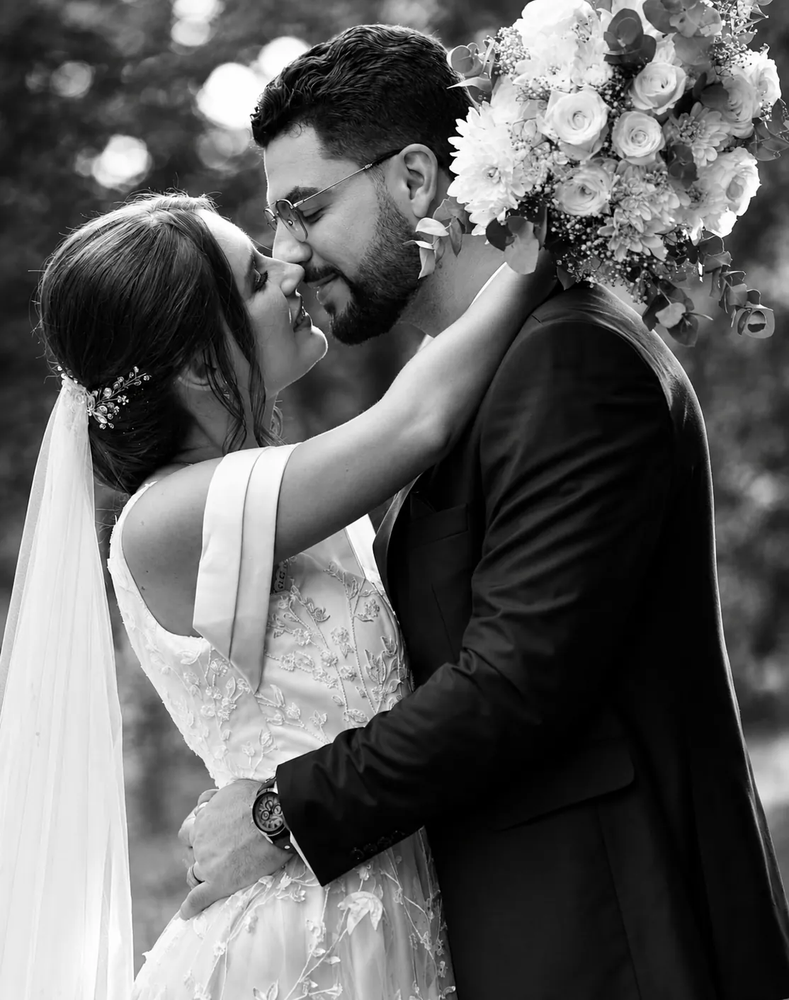 Newlyweds share their first kiss in black and white, Pretoria wedding